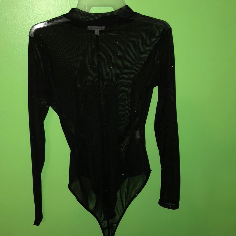 All black body suit